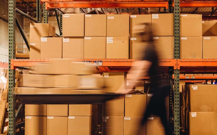 walking-quickly-through-warehouse-with-cart-1