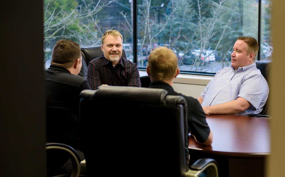 employees-having-discussion-in-conference-room
